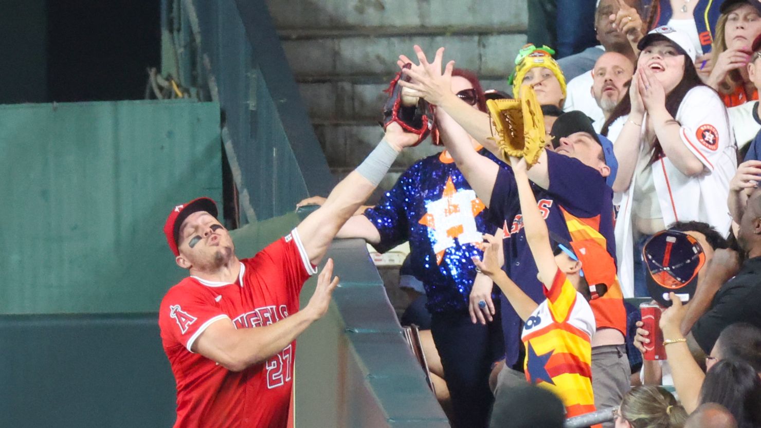 The ball was ruled foul as the catch occurred outside of the field of play.