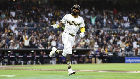 San Diego Padres' Jason Heyward points towards his dugout while running the bases after hitting a solo home run against the Colorado Rockies in the first inning of a baseball game Saturday, April 12, 2025, in San Diego. (AP Photo/Derrick Tuskan)