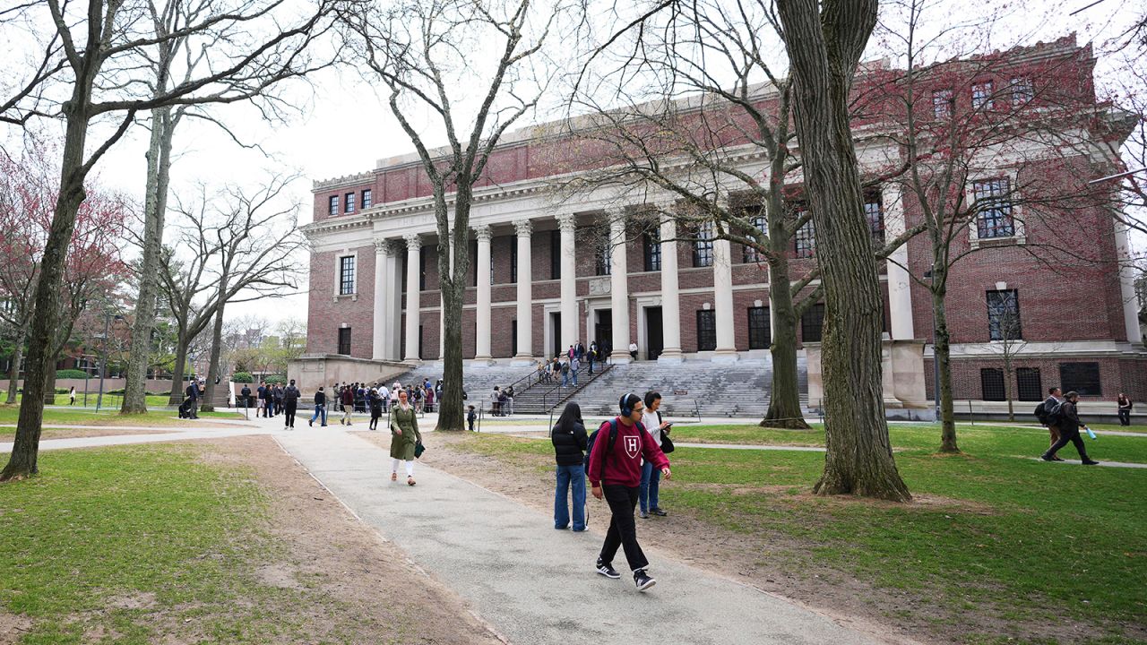 Pedestrians walk past the Widener Library at Harvard University, Tuesday, April 15, 2025, in Cambridge, Massachusetts.