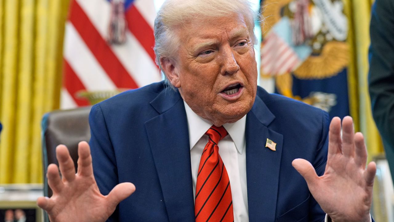 President Donald Trump speaks as he signs executive orders in the Oval Office of the White House on Thursday.