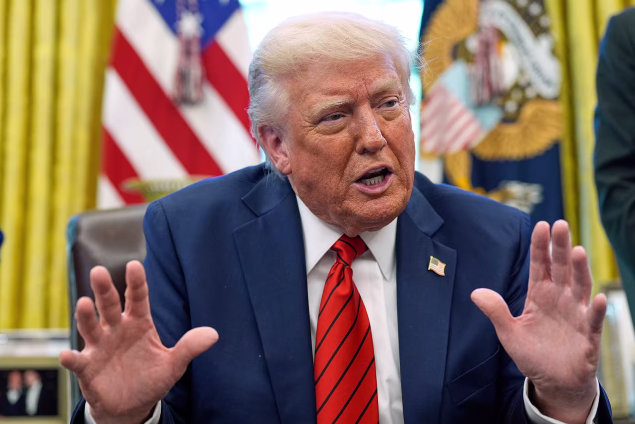 President Donald Trump speaks as he signs executive orders in the Oval Office of the White House on Thursday.