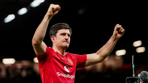 Harry Maguire of Manchester United celebrates with the fans at the end of the Manchester United vs Olympique Lyonnais Quarter Final 2nd Leg UEFA Europa League match at Old Trafford, Manchester, England, on April 17, 2025.