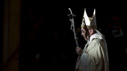 Pope Francis holds the pastoral staff as he leaves after celebrating a Mass in St. Peter's Basilica, at the Vatican, to mark Epiphany, Monday, Jan. 6, 2014.