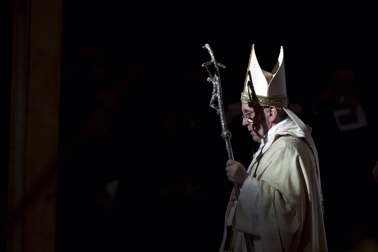 Pope Francis holds the pastoral staff as he leaves after celebrating a Mass in St. Peter's Basilica, at the Vatican in January 2014.