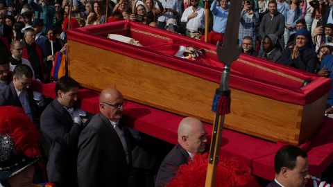 The body of Pope Francis is carried into St. Peter's Basilica at the Vatican, Wednesday, April 23, 2025, where he will lie in state for three days. (AP Photo/Emilio Morenatti)