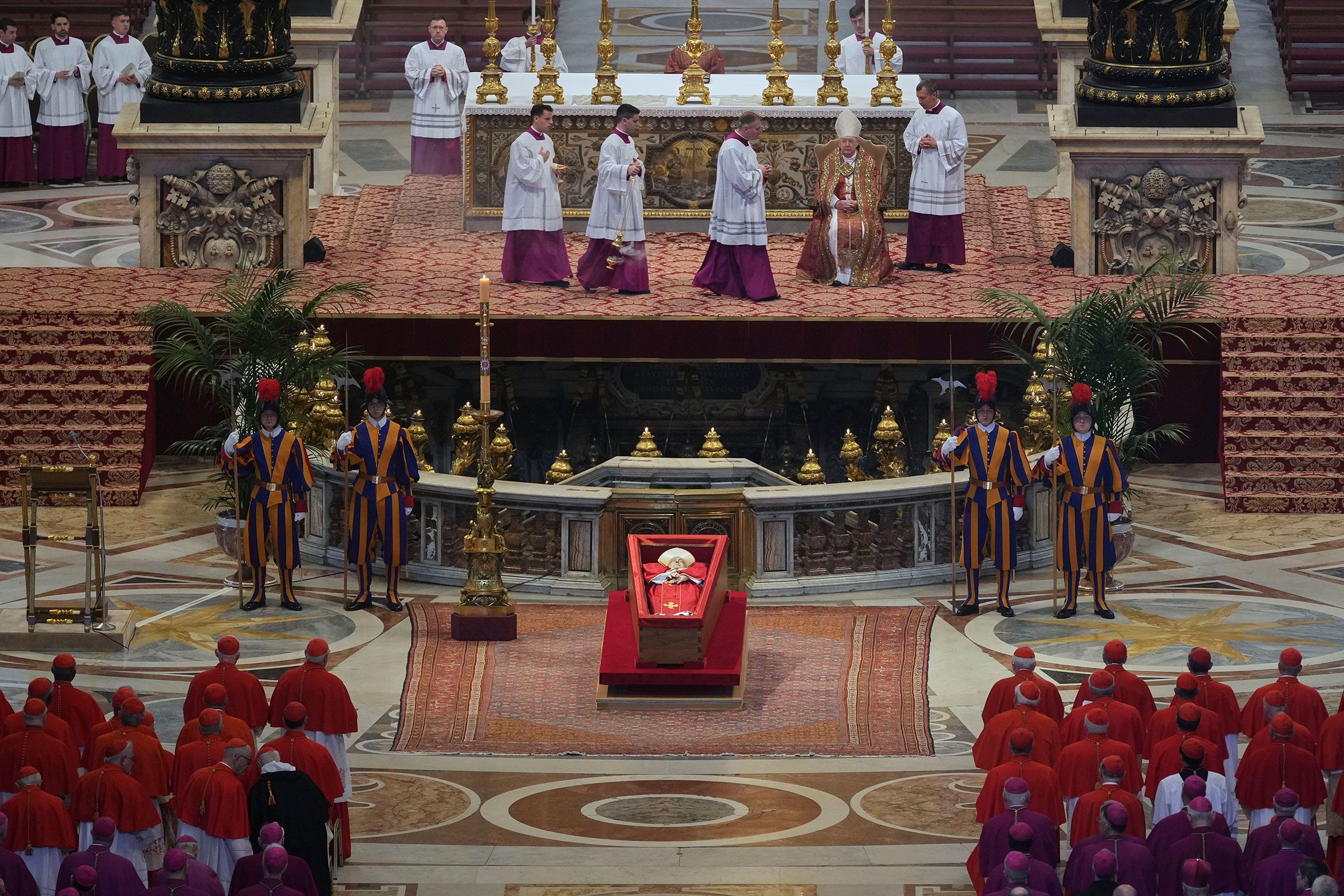 The coffin carrying Pope Francis lies inside St. Peter's Basilica on Wednesday, April 23.