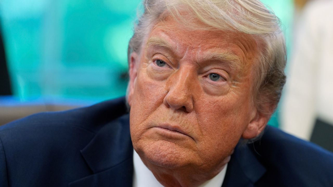 US President Donald Trump speaks with reporters after signing executive orders in the Oval Office of the White House on April 23, 2025.