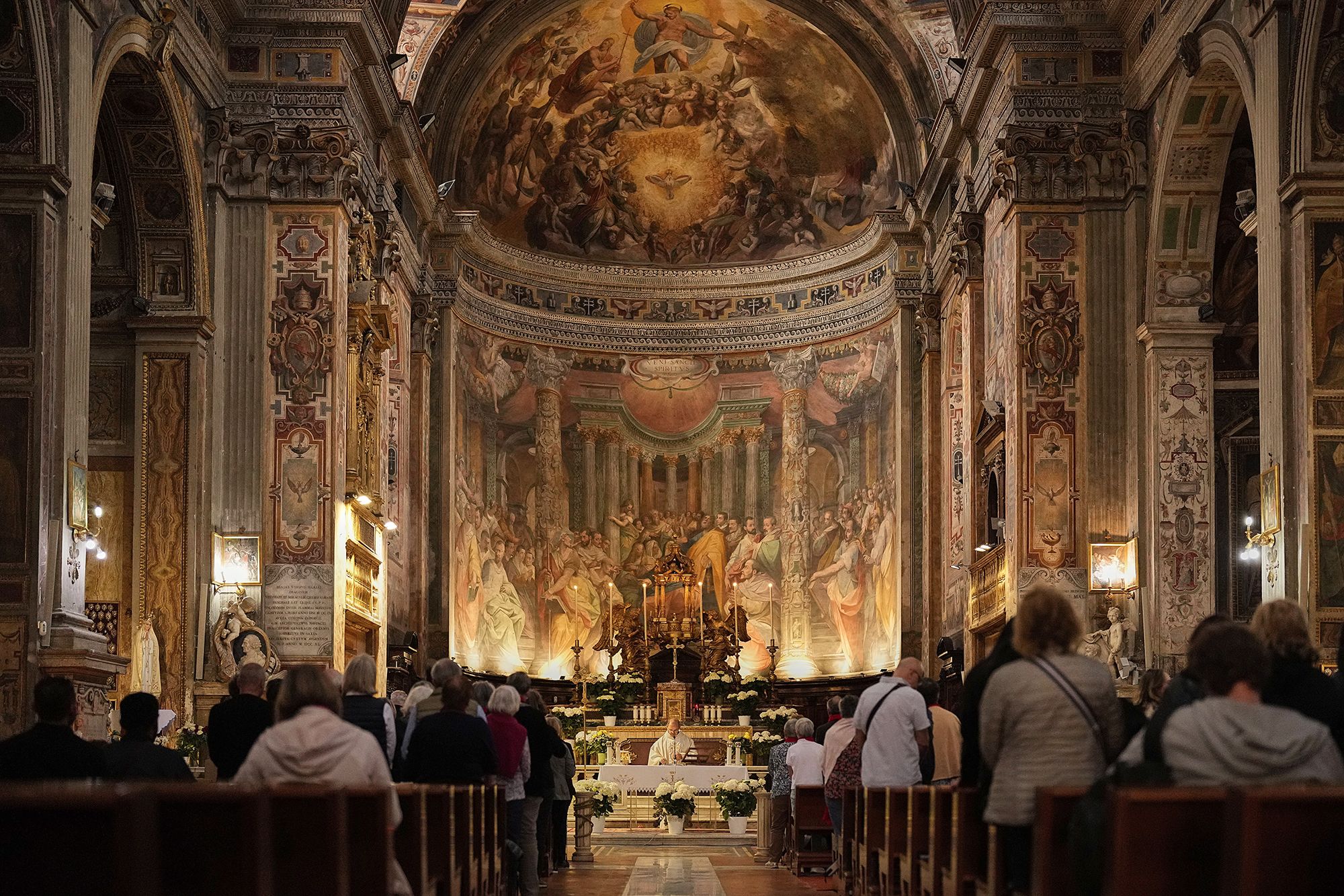 Priest Alain Mousques speaks during a Mass in memory of Pope Francis at the Chiesa di Santo Spirito in Sassia on Thursday.