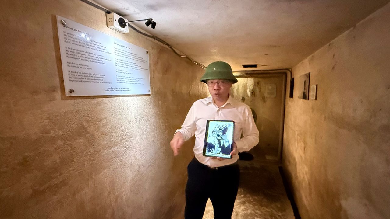 Historian Nguyen Thanh Tung walks guests through the Metropole hotel bunker.