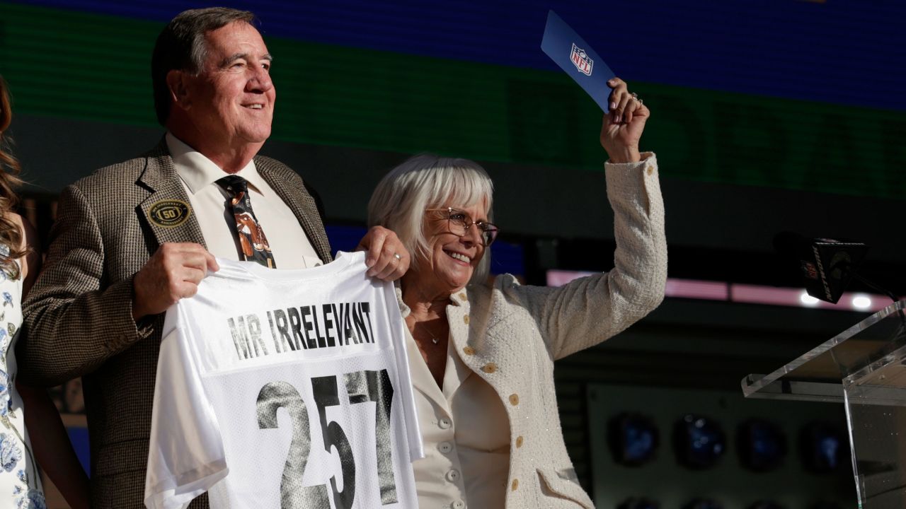 Melanie Salata-Fitch, right, announces Memphis' Kobee Minor as the final pick in the 2025 NFL Draft by New England Patriots.