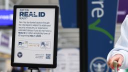 A U.S. Department of Homeland Security "Real ID" compliant driver's license sign outside the TSA checkpoint at Chicago O'Hare International Airport, Wednesday, Apr. 23, 2025 in Chicago. (Aaron M. Sprecher via AP)