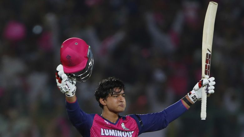 Rajasthan Royals' Vaibhav Suryavanshi, 14, acknowledges the moment after scoring a century during the Indian Premier League cricket match between Rajasthan Royals and Gujarat Titans.