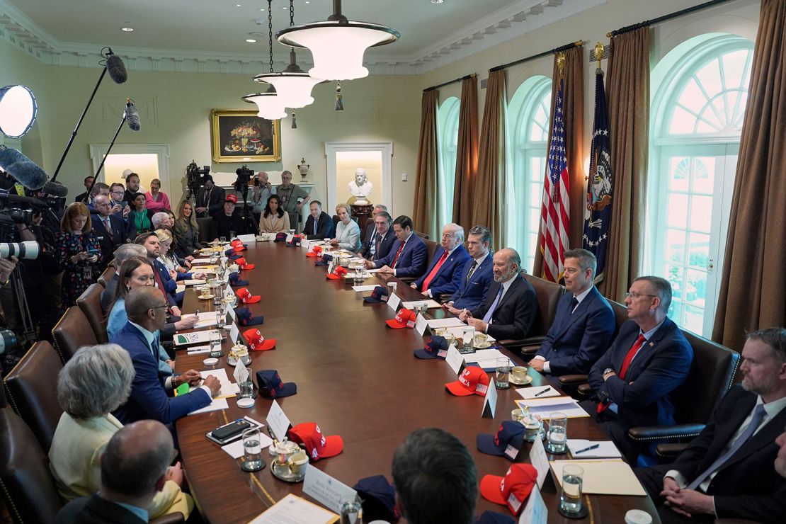 President Donald Trump, center left, listens during a Cabinet meeting at the White House, Wednesday, April 30, 2025, in Washington.