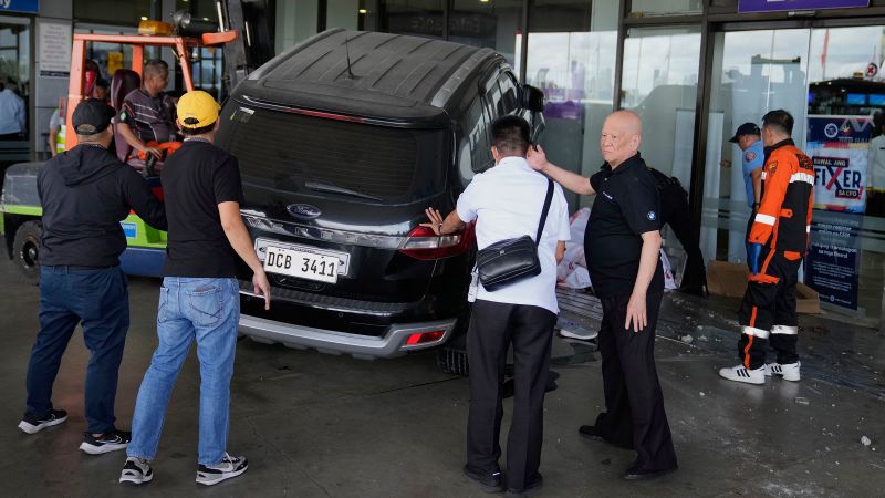 Four-year-old girl and man dead after driver crashes SUV into Manila airport, Red Cross says