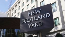 A sign stands in front of the New Scotland Yard, the headquarters of the London Metropolitan Police, in 2023.