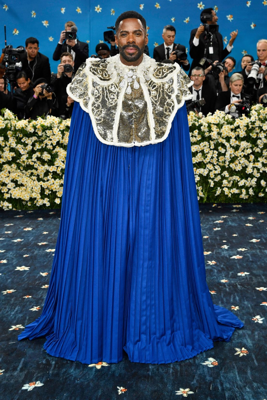 Event co-chair Colman Domingo’s first Met Gala look is a dramatic, floor-sweeping Valentino cape, in part referencing kings and the late stylist André Leon Talley’s iconic 2011 Met Gala outfit.