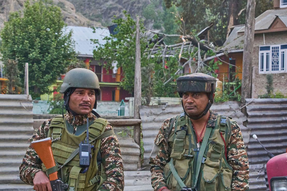 Indian soldiers stand guard at Pampore, in Indian-administered Kashmir, on May 7, 2025.