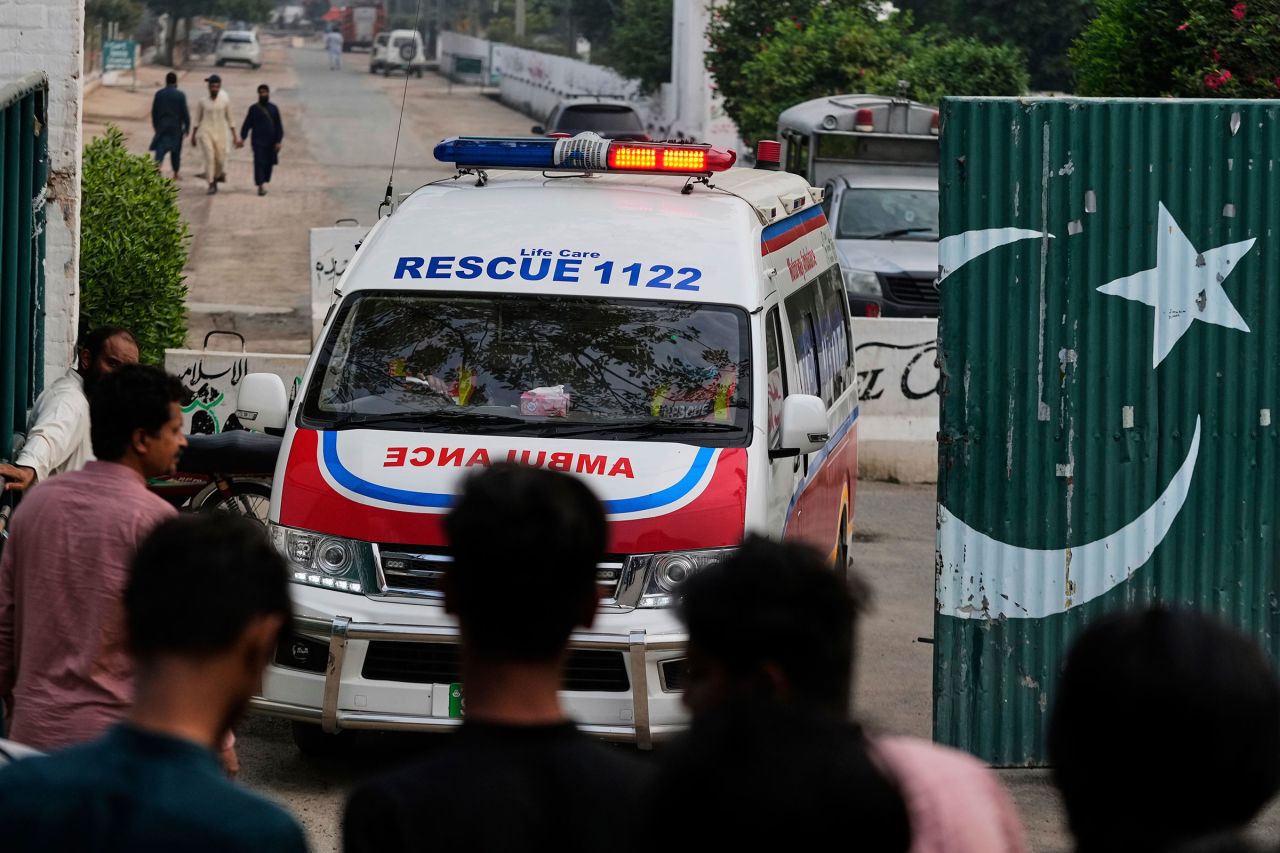 An ambulance leaves a complex near the site of an Indian missile strike, in Muridke, Pakistan, on Wednesday.