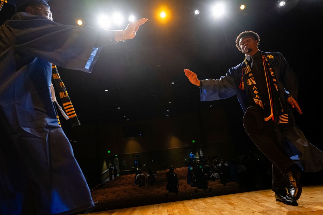Graduates dance on stage after receiving their certificates of achievement during the Senior Salute at Lyric Theatre in Lexington, Kentucky, on May 7, 2025.
