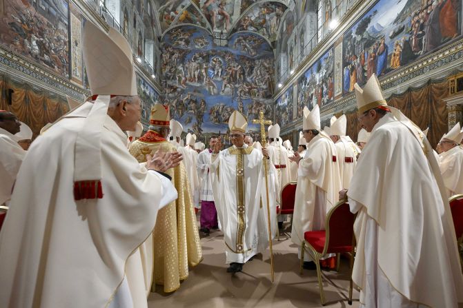 Leo leaves the Sistine Chapel after concelebrating Mass.