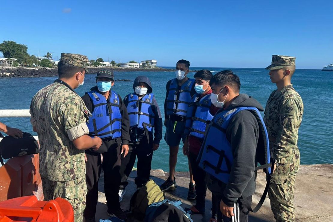 This government handout photo shows five shipwrecked fishermen wearing lifejackets, who were rescued by an Ecuadorian tuna fishing boat after being adrift for more than 50 days, at the San Cristobal Naval Base, Galapagos Islands, on May 10.