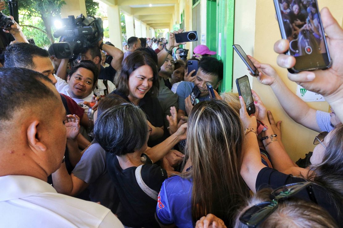 Philippine Vice President Sara Duterte-Carpio arrives to cast her vote at a polling center in Davao City, southern Philippines on May 12, 2025.