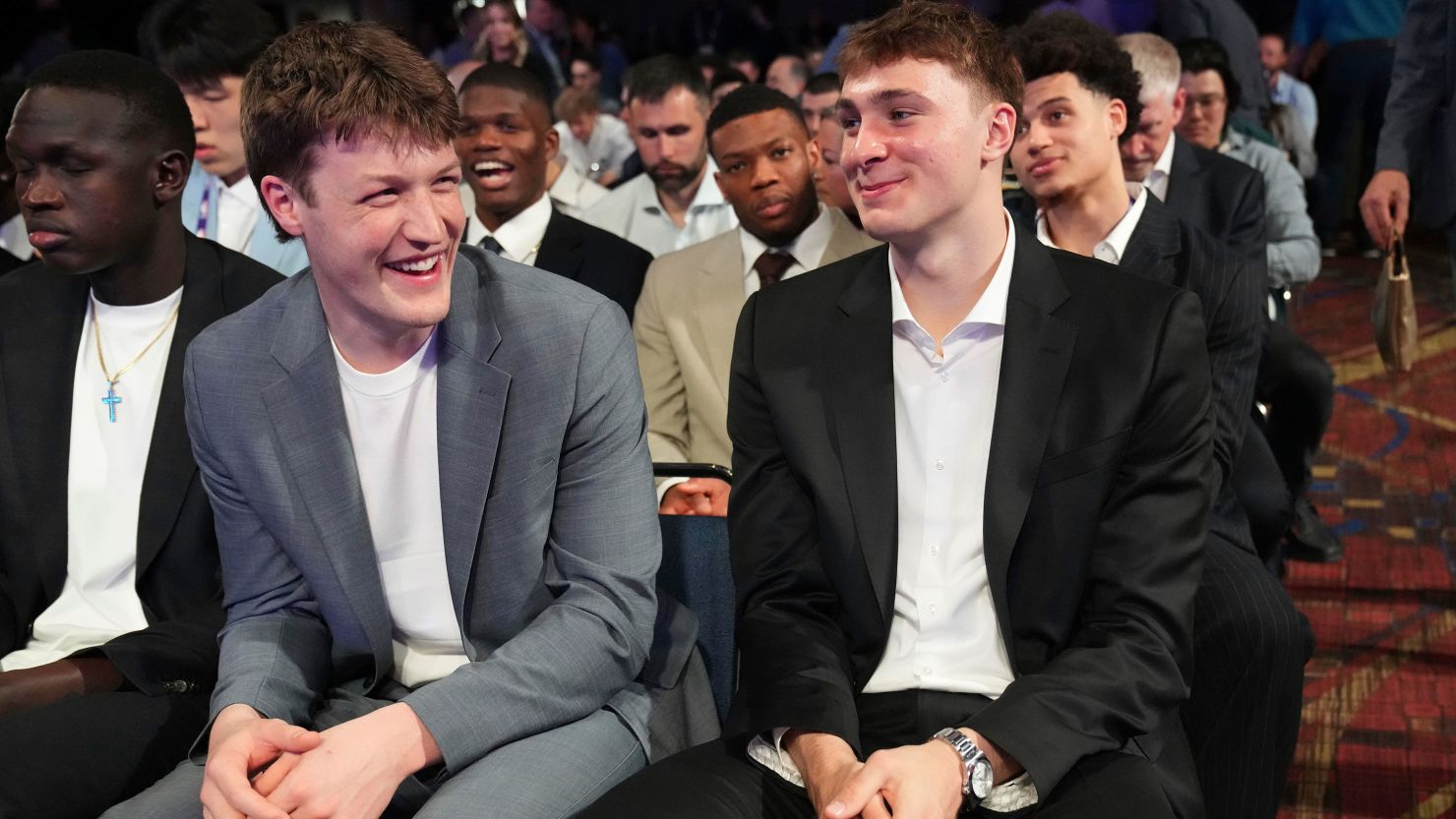 Duke's Kon Knueppel, left, and Cooper Flagg, right, smile at the NBA draft lottery in Chicago on Monday.