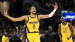 Indiana Pacers guard Tyrese Haliburton, left, celebrates along with forward Pascal Siakam after scoring during the second half in Game 5 of an Eastern Conference semifinal NBA basketball playoff against the Cleveland Cavaliers, Tuesday, May 13, 2025, in Cleveland. (AP Photo/Sue Ogrocki)