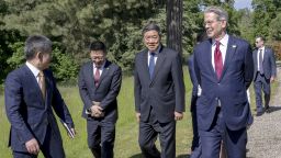 U.S. Secretary of the Treasury Scott Bessent, center right, U.S. Trade Representative Jamieson Greer, right, Chinese Vice Premier He Lifeng, center right, and Chinese ambassador to the World Trade Organization Li Chenggang, speak during a bilateral meeting between the United States and China, in Geneva, Switzerland, on Saturday, May 10, 2025. (Martial Trezzini/Keystone via AP)