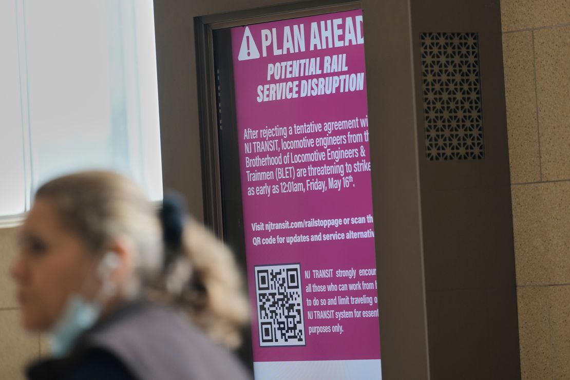 An electronic display advises commuters of potential NJ Transit service disruptions at the Secaucus Junction station in Secaucus, N.J., Wednesday, May 14, 2025. (AP Photo/Seth Wenig)