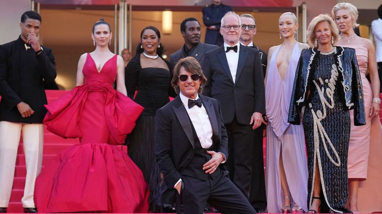 Tom Cruise, front, editor Eddie Hamilton, from back left, Greg Tarzan Davis, Hayley Atwell, Angela Bassett, Tramell Tillman, festival director Thierry Fremaux, Simon Pegg, Pom Klementieff, Iris Knobloch, Hannah Waddingham and Esai Morales pose for photographers upon arrival at the premiere of the film 'Mission: Impossible - The Final Reckoning' at the 78th international film festival, Cannes, southern France, Wednesday, May 14, 2025. (AP Photo/Natacha Pisarenko)