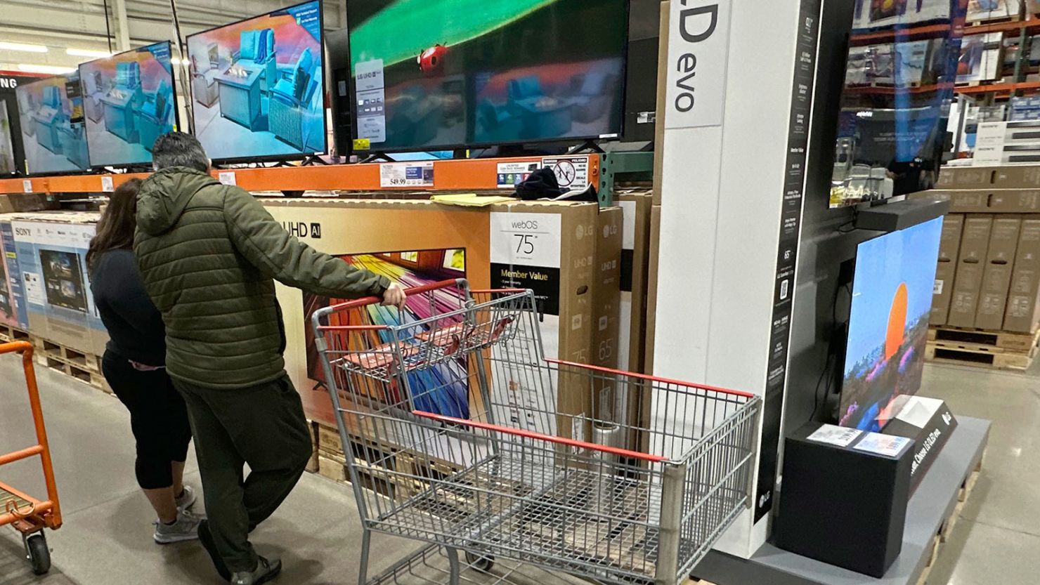 Shoppers consider big-screen televisions on display in a Costco store on April 1, 2025, in Thornton, Colorado.