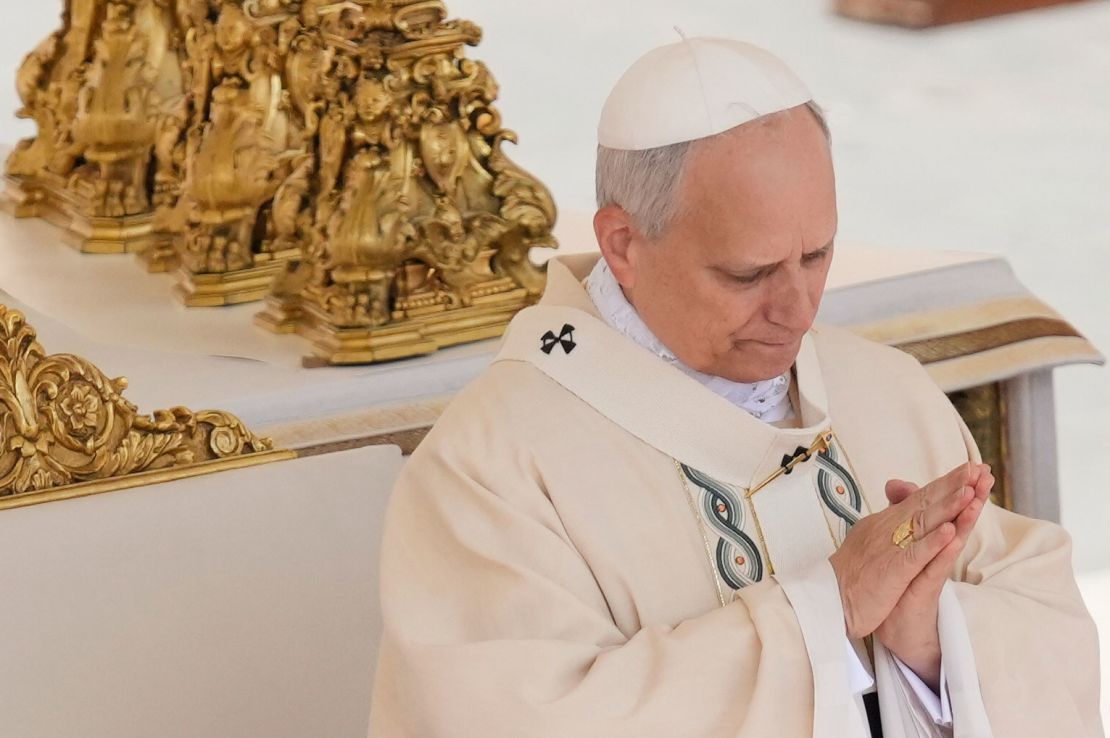 Pope Leo wears the fisherman's ring during a Mass for the formal inauguration of his pontificate.