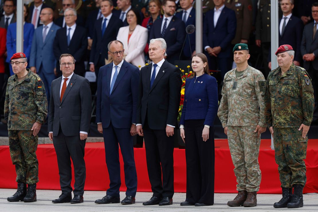 Lithuania's President Gitanas Nauseda, German Chancellor Friedrich Merz, Lithuania Defense Minister Docile Sakaliene and German Defense Minister Boris Pistorius participate with military leaders at a formal inauguration of a German brigade for NATO's eastern flank in Vilnius, Lithuania, on Thursday, May 22, 2025.