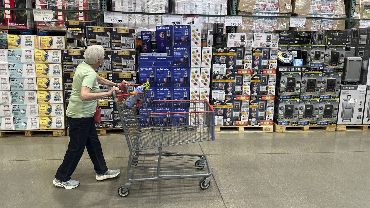 A shopper surveys goods on display in a Costco warehouse Wednesday, May 21, 2025, in Lone Tree, Colorado.
