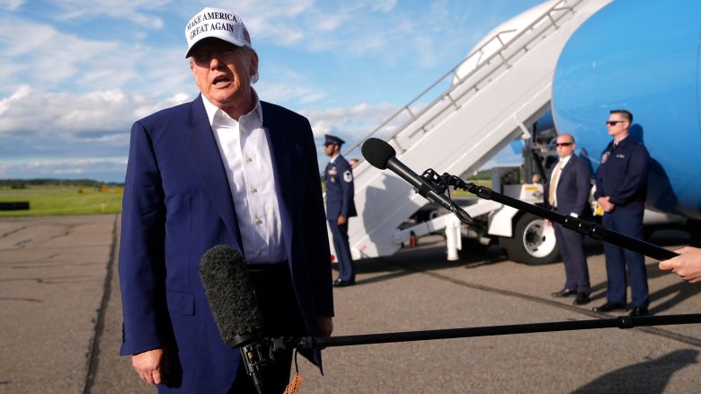 President Donald Trump speaks to reporters before boarding Air Force One at Morristown Municipal Airport in Morristown, N.J., Sunday, May 25, 2025. (AP Photo/Manuel Balce Ceneta)