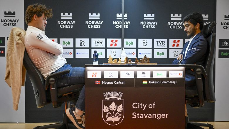 Magnus Carlsen (left) suffered a surprise loss to Gukesh Dommaraju (right) at the Norway Chess tournament.