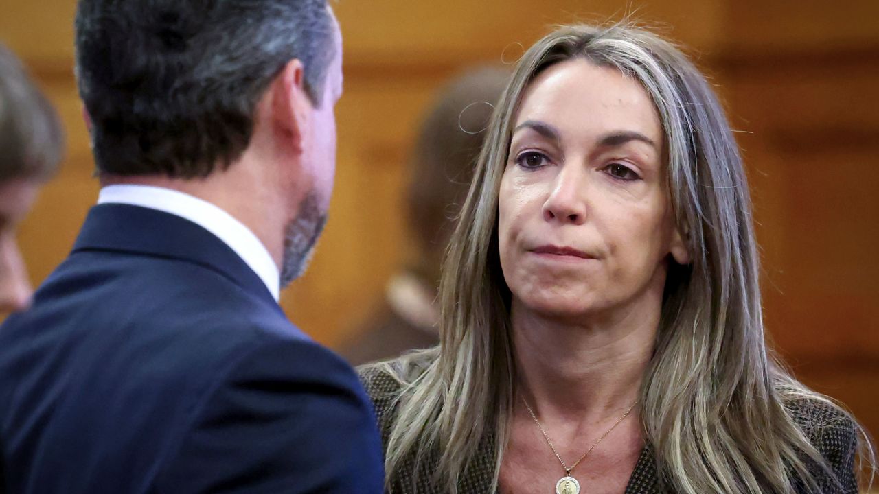Karen Read speaks with her defense attorney, Alan Jackson, during her retrial in Norfolk Superior Court, Thursday, May 29, 2025, in Dedham, Mass. (AP Photo/Mark Stockwell, Pool) 