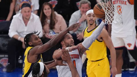 New York Knicks guard Jalen Brunson goes up for a shot against Indiana Pacers forward Aaron Nesmith and center Myles Turner during Game 5 of the NBA Eastern Conference Final in New York, on Thursday, May 29, 2025.