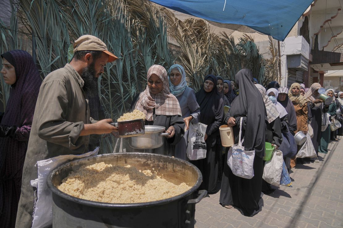 A Palestinian woman from a food distribution kitchen in Deial Rose, Gaza Strip, on May 30, 2025.