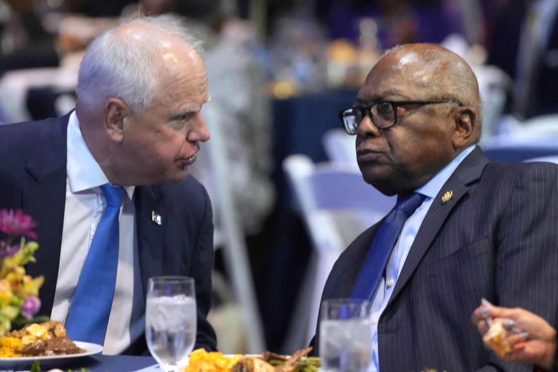 Walz speaks with Rep. Jim Clyburn at the South Carolina Democratic Party's Blue Palmetto Dinner on May 30, 2025, in Columbia, South Carolina.