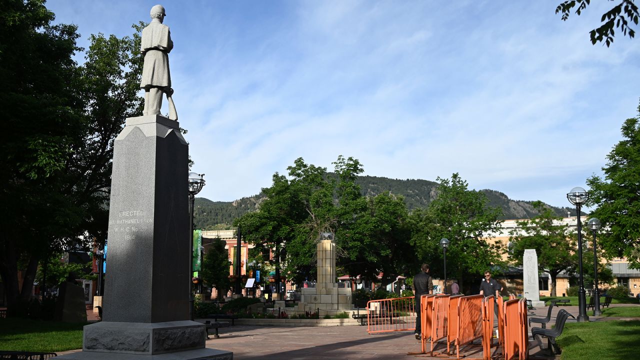 Crews clean up a sidewalk after a man sets people on fire during a demonstration at Pearl Street Mall in Boulder, Colorado, United States, on June 2, 2025.
