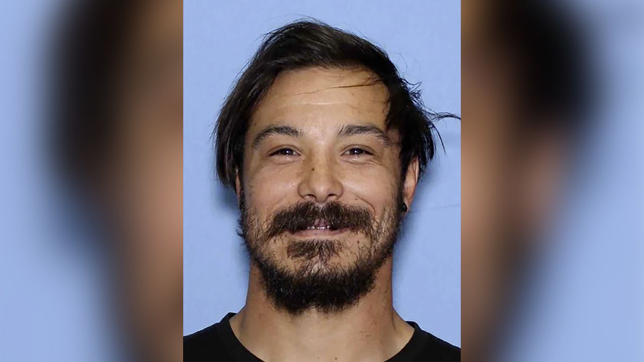 This undated photo provided by the Wenatchee Police Department shows Travis Caleb Decker, who is wanted for murder after his three young daughters were reported missing and then found dead.