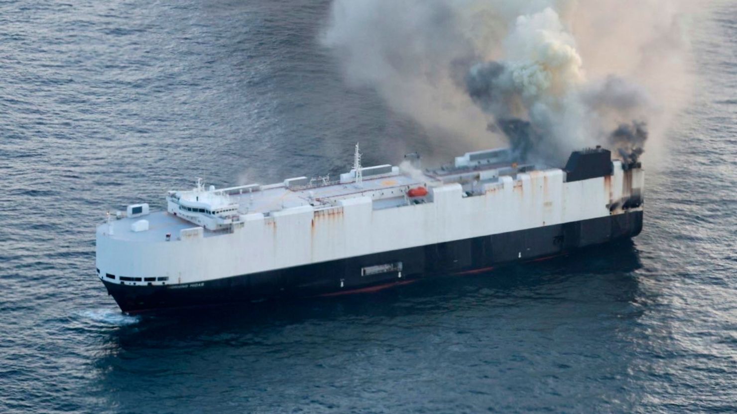 Smoke rises from cargo vessel Morning Midas approximately 300 miles south of Adak, Alaska, June 3, 2025, as the crew of a cargo ship carrying around 3,000 vehicles to Mexico, abandoned ship after they could not control a fire.