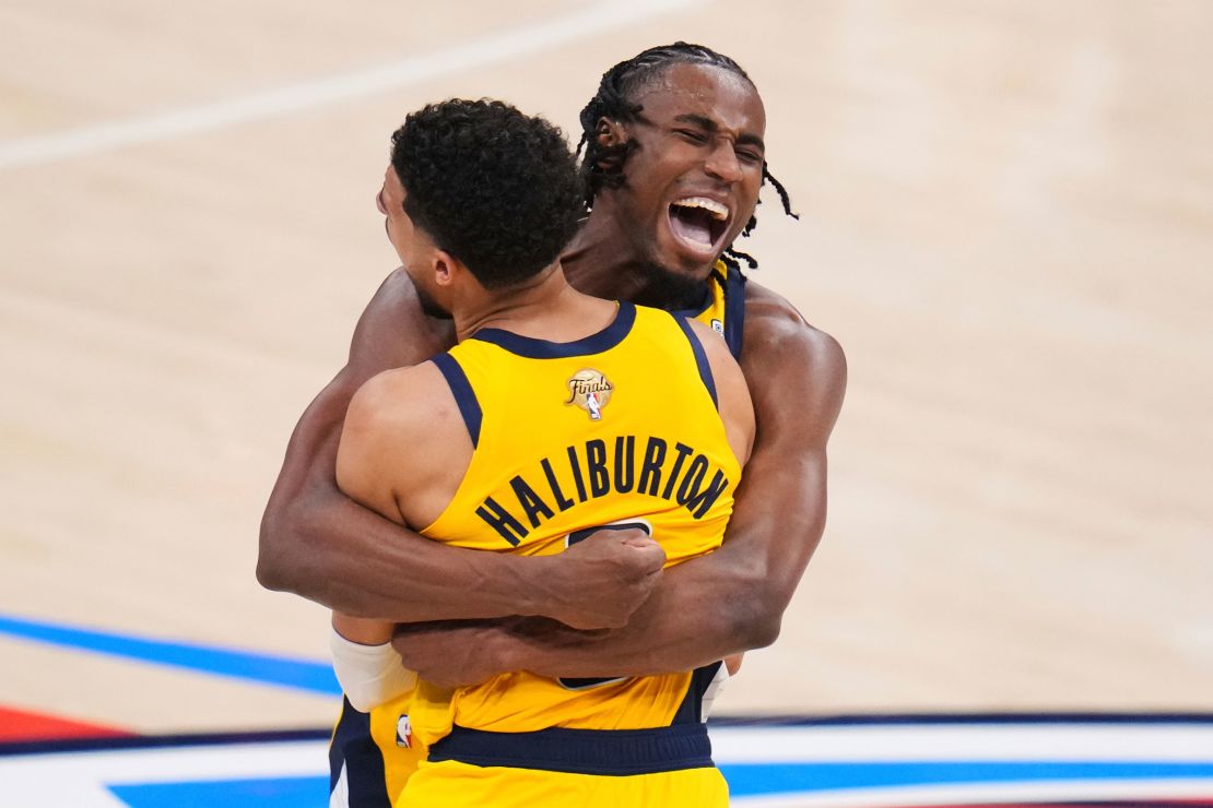 Indiana Pacers guard Tyrese Haliburton celebrates with forward Aaron Nesmith after making a 3-pointer during the second half.