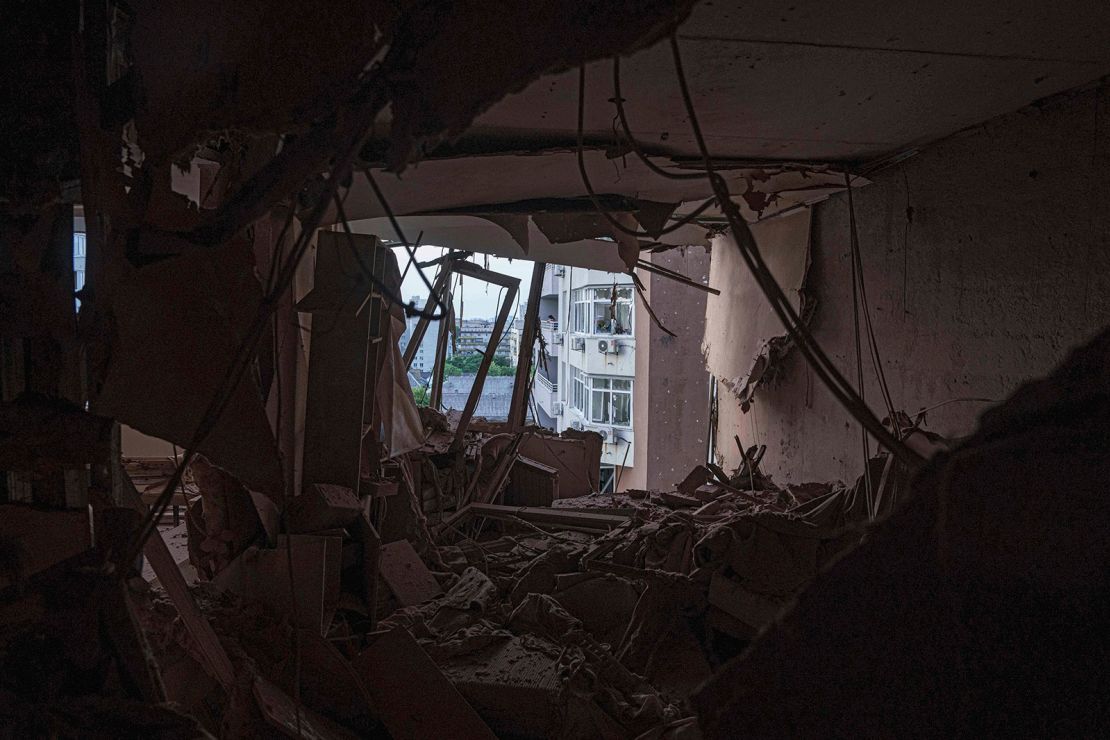 An apartment of a residential multi-storey building is seen damaged after a Russian drone strike on Kyiv, Ukraine, on Friday.