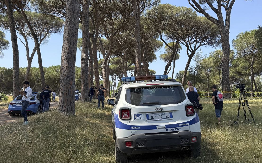 Police investigatein the Villa Doria Pamphili city park on June 8 after two bodies were found.