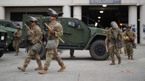 U.S. National Guard are deployed around downtown Los Angeles, Sunday, June 8, 2025, following an immigration raid protest the night before. (AP Photo/Eric Thayer)