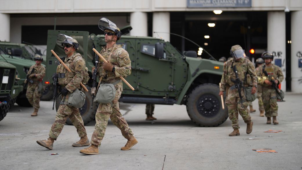 U.S. National Guard are deployed around downtown Los Angeles, Sunday, June 8, 2025, following an immigration raid protest the night before. (AP Photo/Eric Thayer)