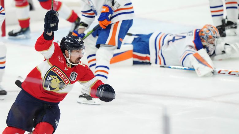 Florida Panthers' Brad Marchand (63) celebrates his goal against Edmonton Oilers goalie Stuart Skinner (74) during the first period in Game 3 of the NHL hockey Stanley Cup finals in Sunrise, Florida, on Monday, June 9, 2025.